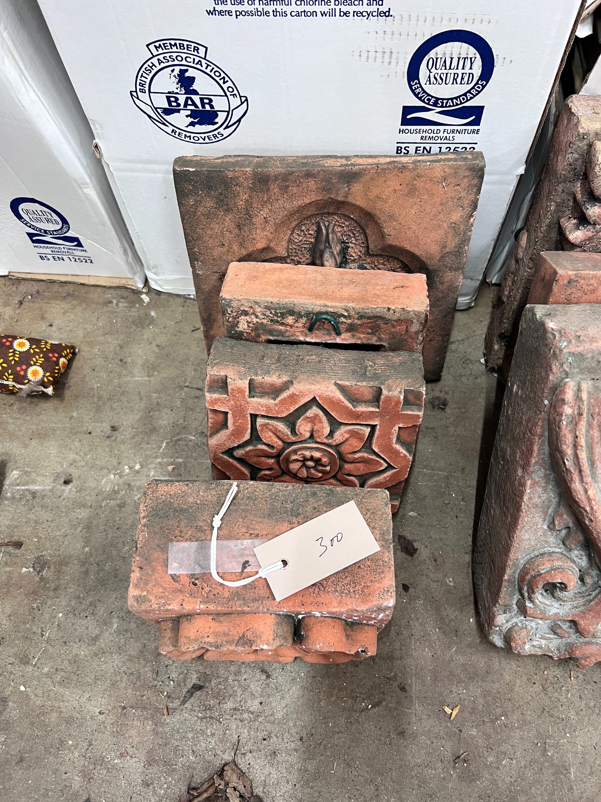 Seven assorted Victorian terracotta architectural decorative motifs, largest 25cm *Please note the sale commences at 9am.